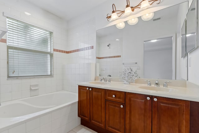 6120 SE Portofino Cir, Hobe Sound, FL 33455 - bathroom featuring a garden tub, tiled shower, double vanity, and a chandelier