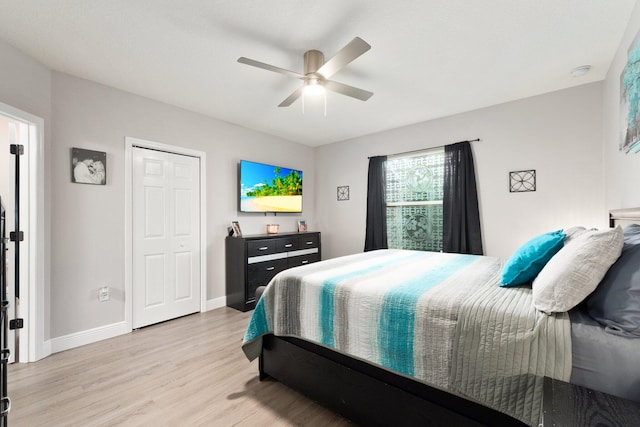 bedroom with ceiling fan and light hardwood / wood-style flooring