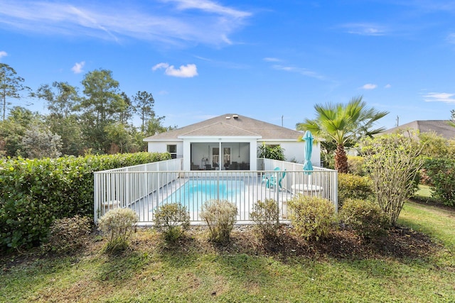 view of swimming pool with a sunroom and a patio