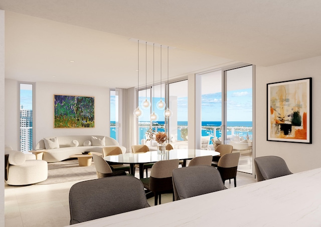 dining room featuring a water view