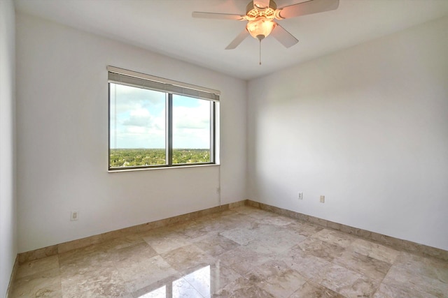 unfurnished room featuring ceiling fan