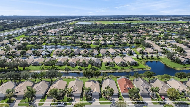 bird's eye view with a water view