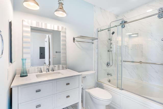 full bathroom featuring bath / shower combo with glass door, electric panel, vanity, and toilet