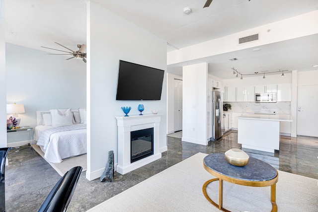 living room featuring ceiling fan