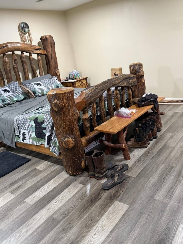 bedroom featuring hardwood / wood-style flooring