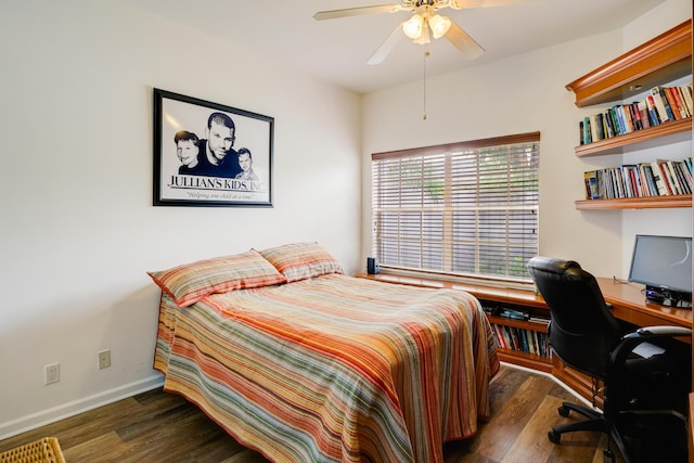 bedroom with dark wood-type flooring and ceiling fan