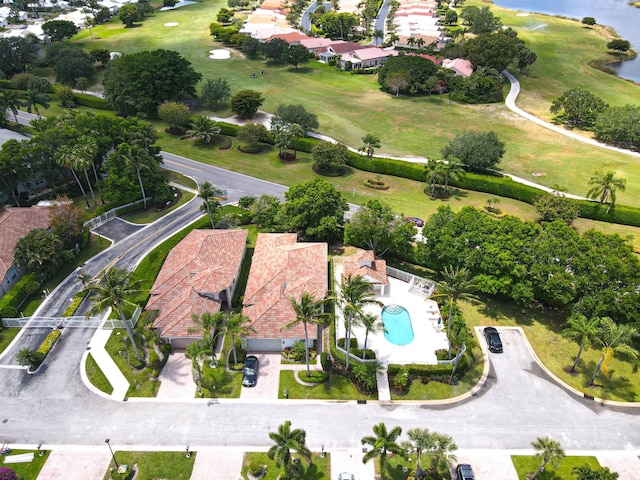 11570 Briarwood Cir Unit 1, Boynton Beach, FL 33437 - aerial view of property's location with a local golf course, a pool, nearby suburban area, and a large body of water