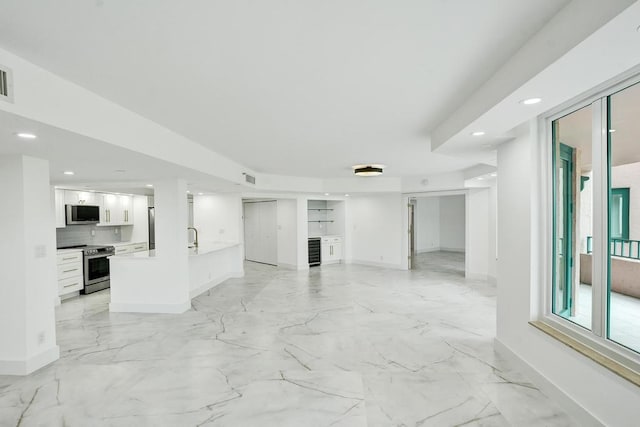 living room with sink and wine cooler