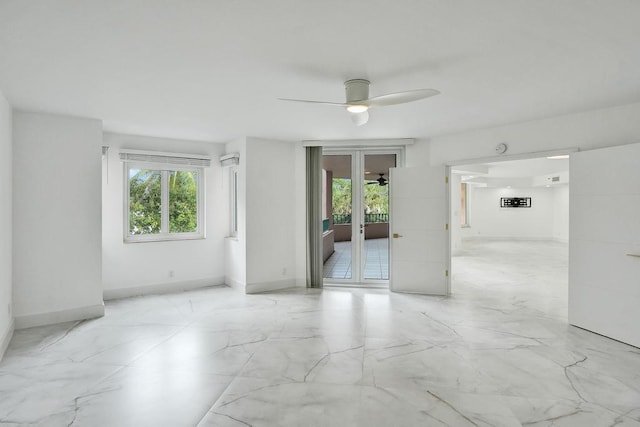 unfurnished room featuring ceiling fan