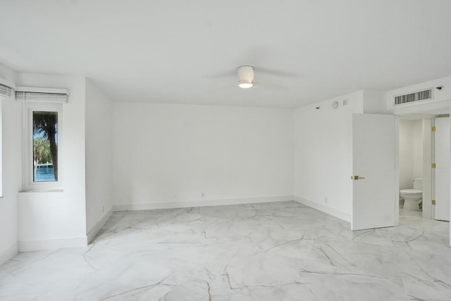 unfurnished room with ceiling fan