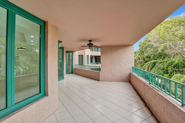 balcony featuring ceiling fan