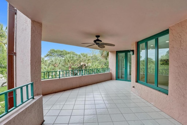 balcony with ceiling fan and a patio area