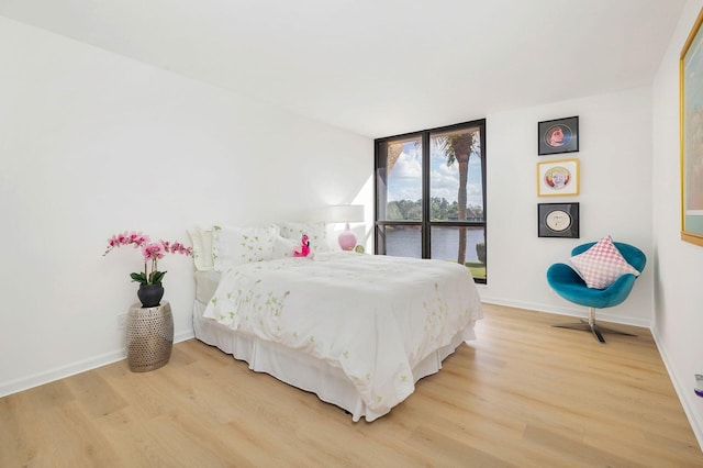 bedroom featuring hardwood / wood-style floors