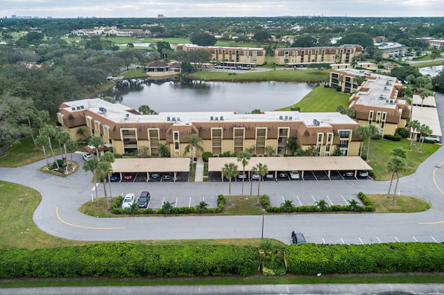 drone / aerial view with a water view