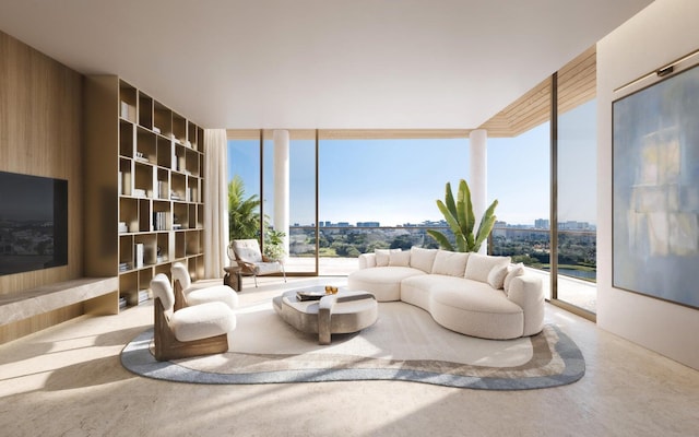 living room with concrete floors, wooden walls, and plenty of natural light