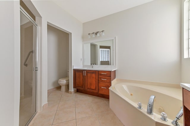 full bathroom featuring tile patterned floors, toilet, vanity, and shower with separate bathtub