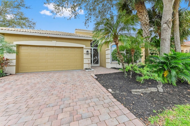 view of front of property featuring a garage