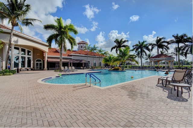 view of swimming pool featuring a patio area