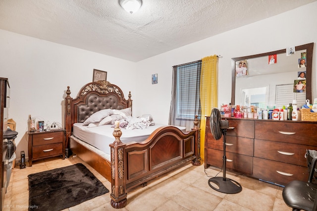 bedroom with a textured ceiling