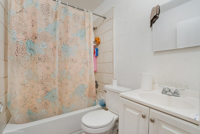 full bathroom with vanity, toilet, and shower / bath combo