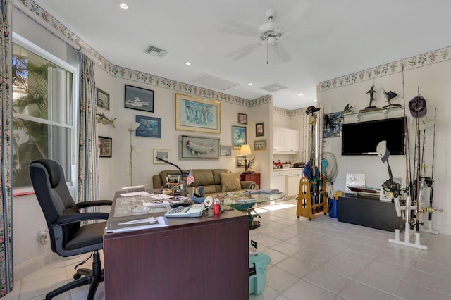 tiled home office with ceiling fan