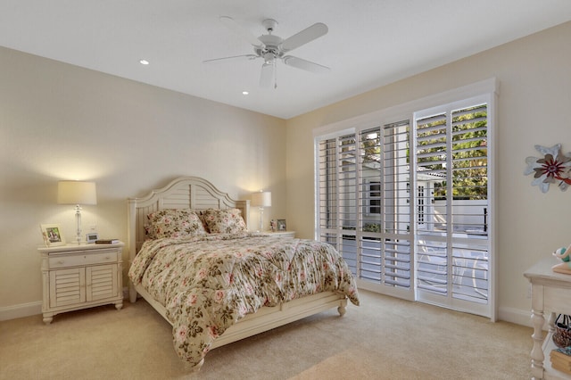 bedroom featuring ceiling fan, light colored carpet, and access to outside