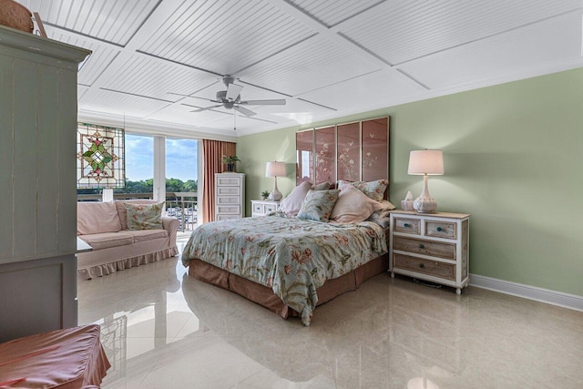 bedroom with ceiling fan, a wall of windows, and access to exterior