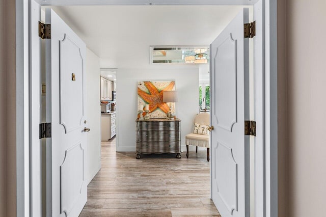 hall featuring light hardwood / wood-style floors