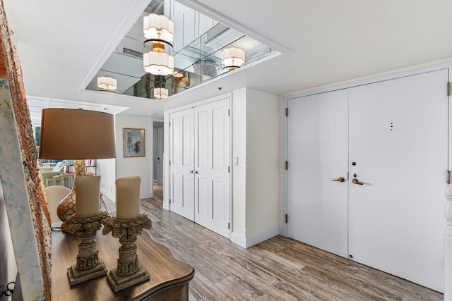 entrance foyer featuring hardwood / wood-style flooring