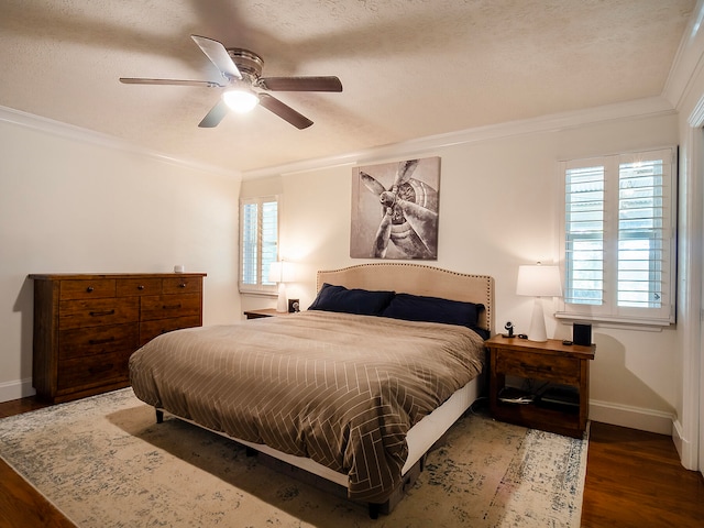 bedroom featuring a textured ceiling, ceiling fan, crown molding, and dark wood-type flooring