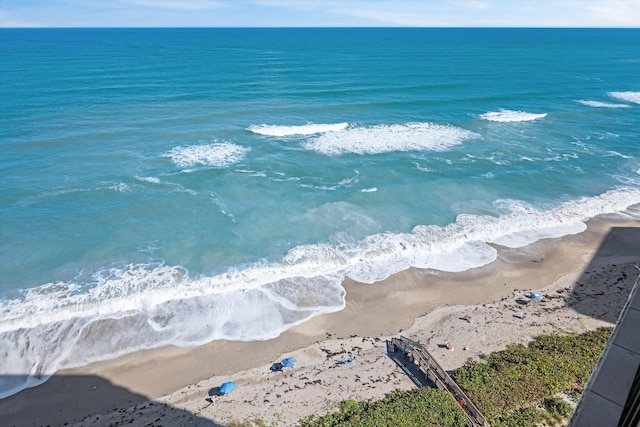 view of water feature with a beach view