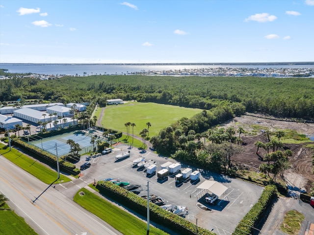 drone / aerial view with a water view