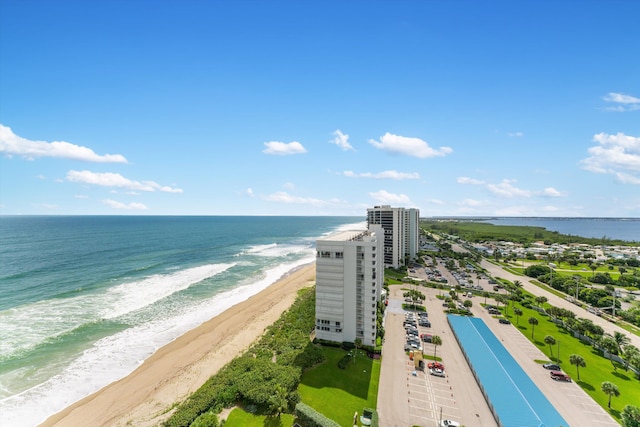 aerial view featuring a water view and a beach view