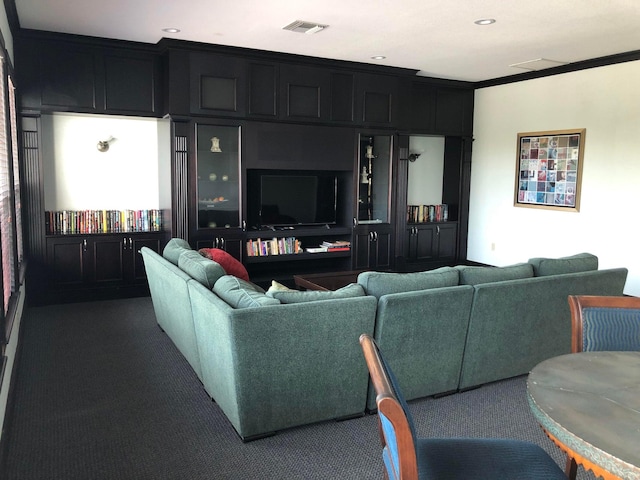 living room featuring carpet floors and crown molding