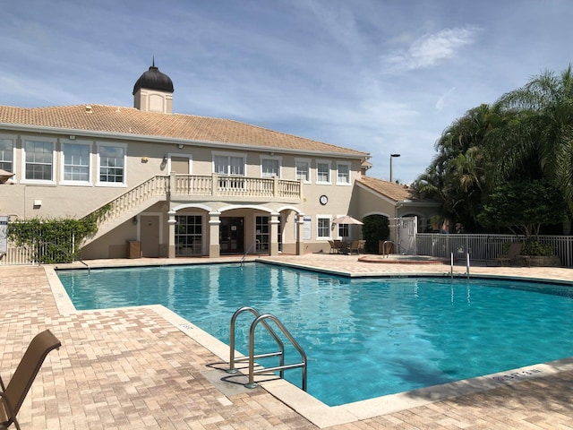 view of swimming pool featuring a patio