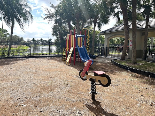 communal playground featuring fence