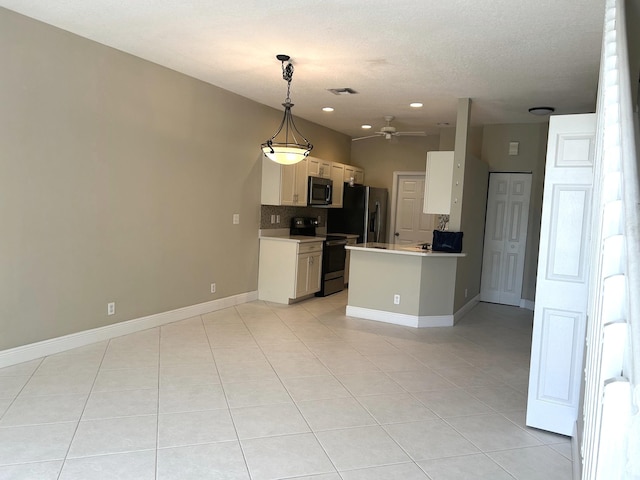 kitchen with tasteful backsplash, visible vents, ceiling fan, appliances with stainless steel finishes, and light tile patterned flooring