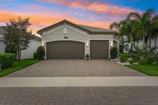 view of front of home featuring a garage