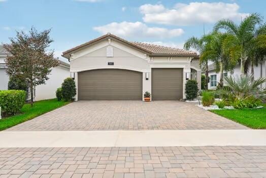 view of front of property featuring a garage