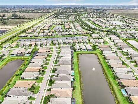 drone / aerial view with a water view