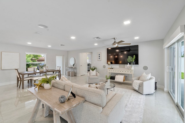 living room with ceiling fan