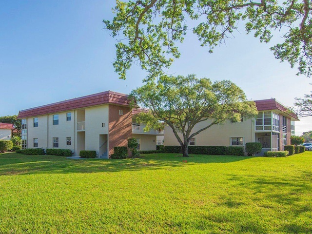 exterior space with a lawn