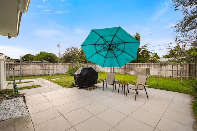 view of patio with a grill