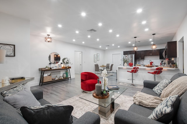 living room featuring light hardwood / wood-style flooring