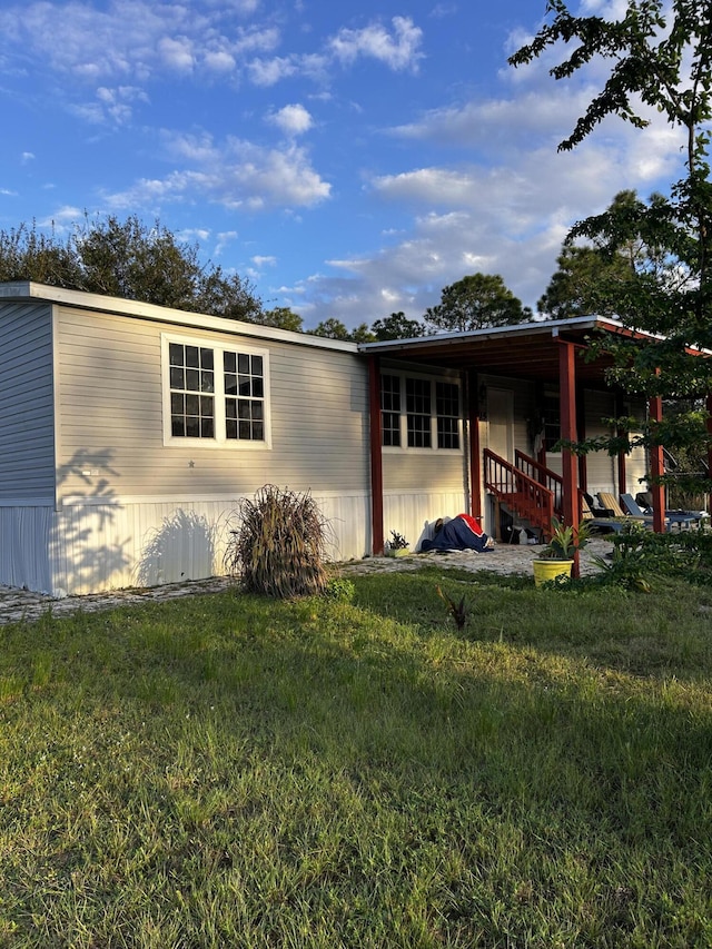 exterior space featuring a yard