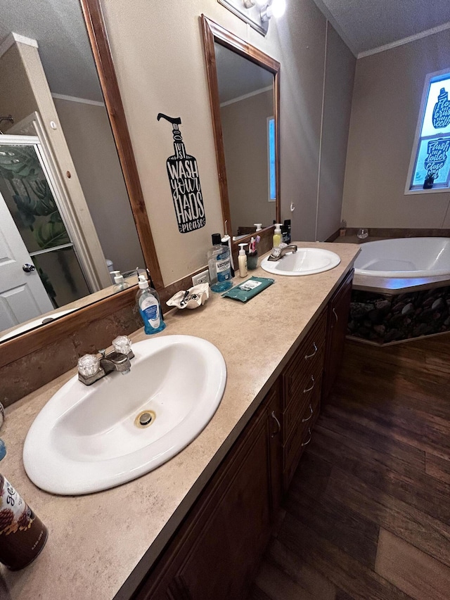 bathroom featuring an enclosed shower, wood-type flooring, ornamental molding, and toilet