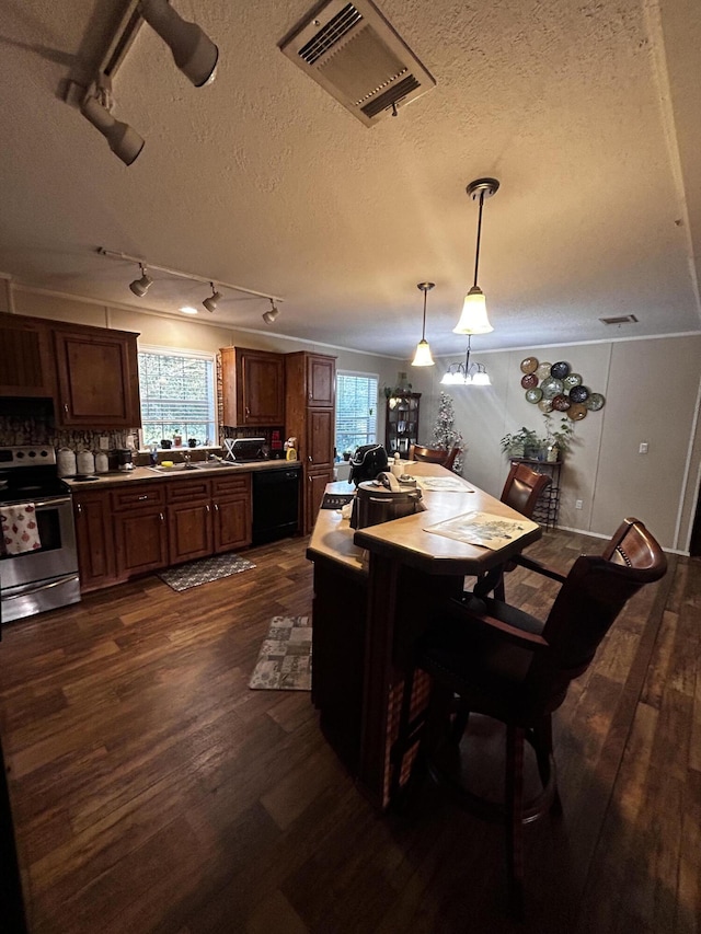 washroom with dark wood-type flooring and separate washer and dryer