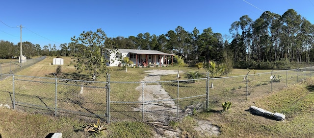 view of front facade featuring a rural view