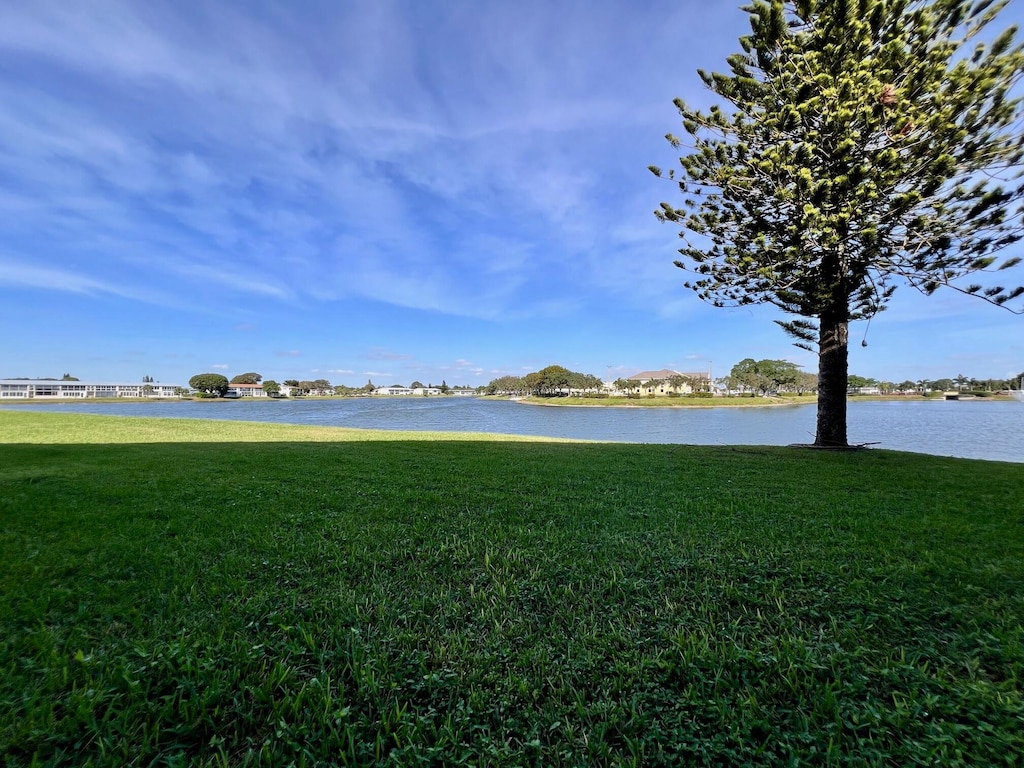 view of yard with a water view