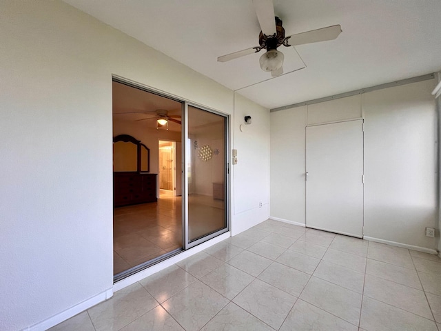 empty room featuring light tile patterned floors